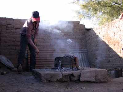 Man firing his pots